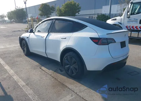 2023 Tesla Model Y Awd/Long Range Dual Motor All-Wheel Drive z USA, uszkodzony, nr VIN 7SAYGDEE7PF625553